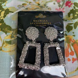 big silver earrings